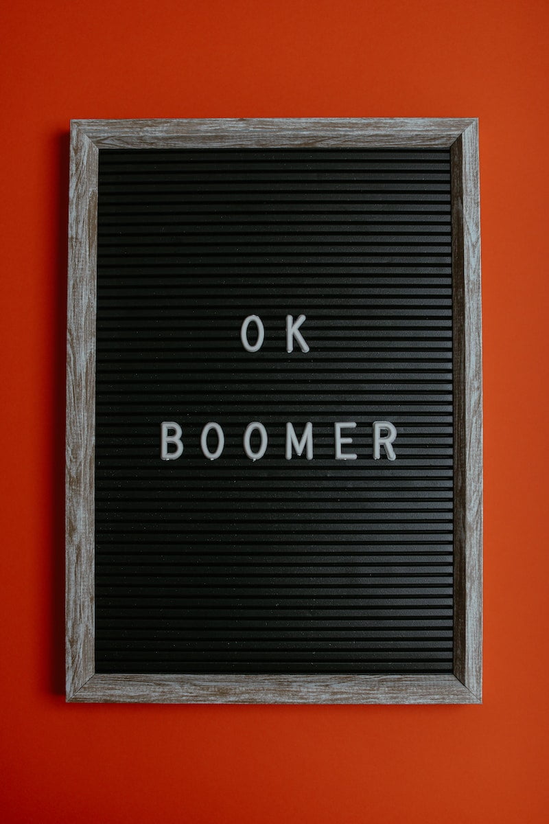 ok boomer, A Letter Board on an Orange Surface
