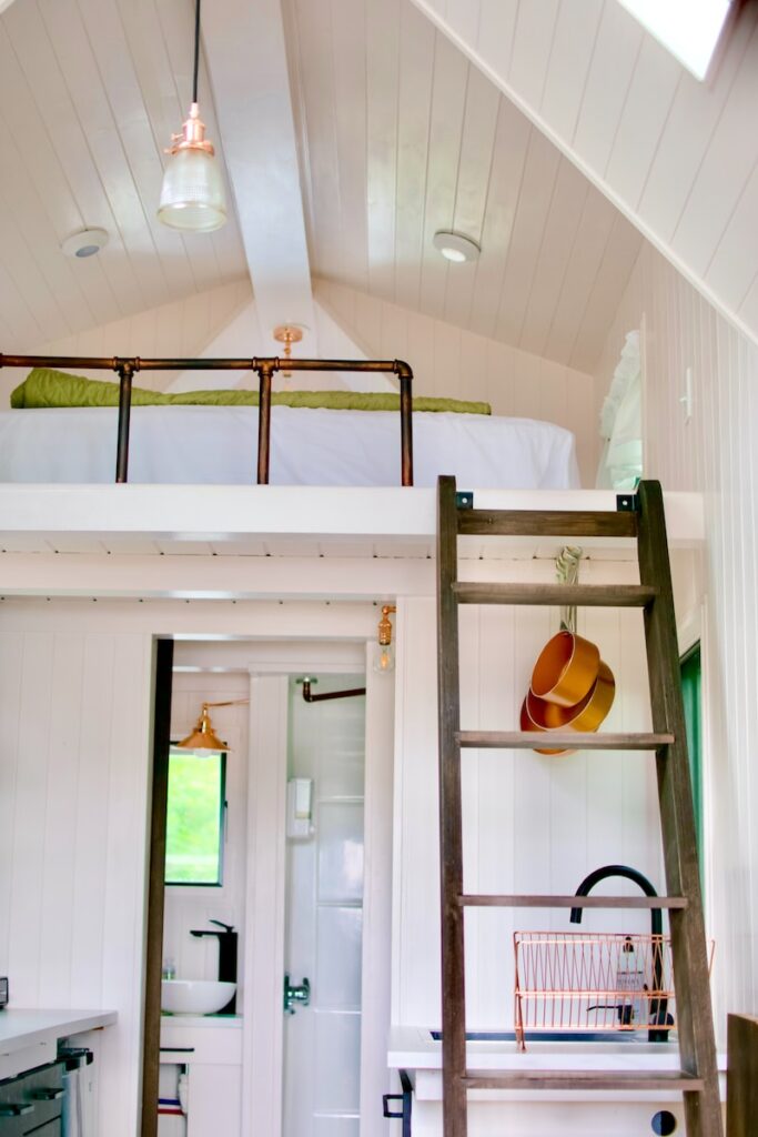 dwell-INshed, guest room with loft, backyard hosting, white wooden framed glass door
